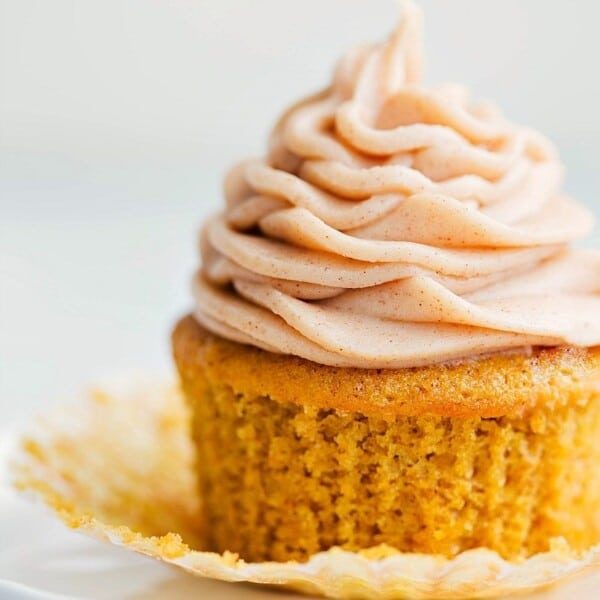 Ready to eat satisfying pumpkin cupcake with a cinnamon cream cheese frosting.