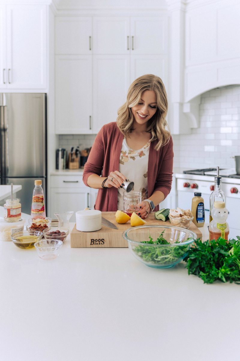 the cook making the dressing for this recipe.