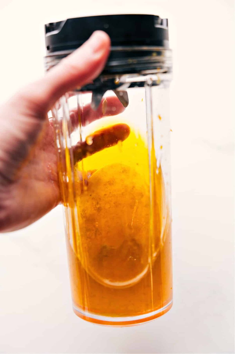 All the dressing ingredients are added to a blender and blended until smooth—the reliable finishing touch for this peach salad.
