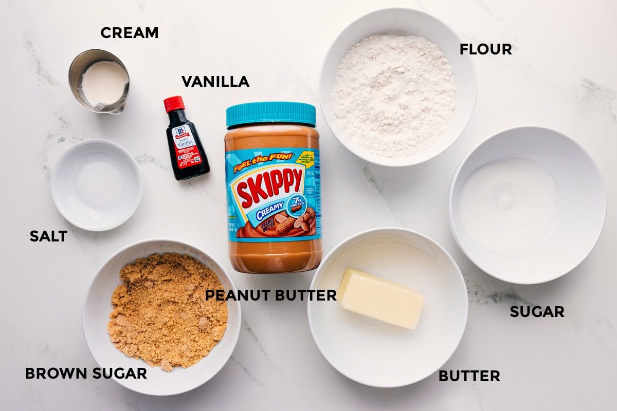 All the ingredients in this recipe prepped out for straightforward assembly including the cream, vanilla, salt, brown sugar, peanut butter, flour, sugar, and butter.
