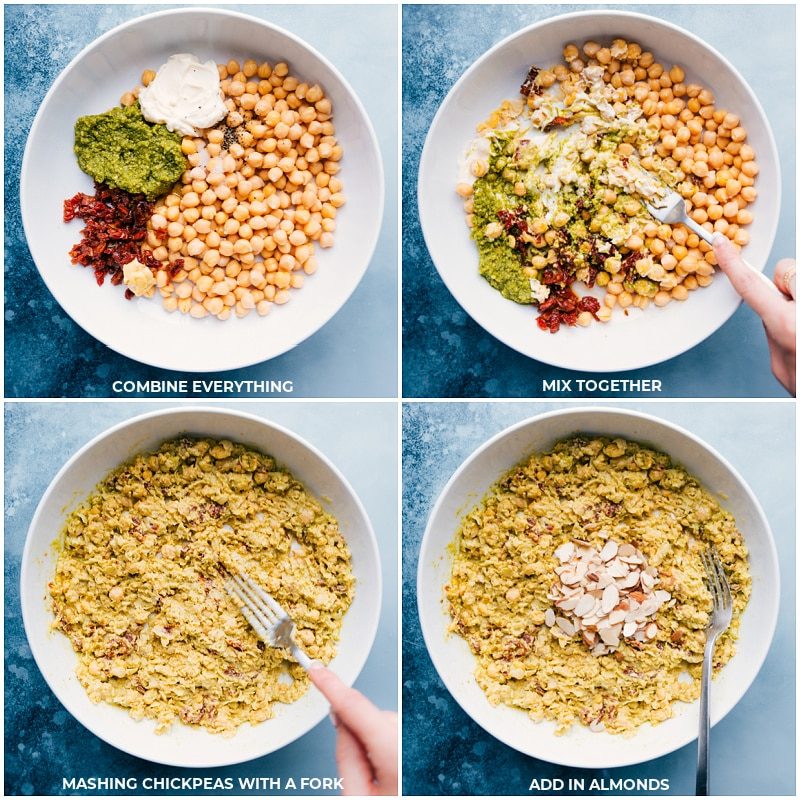 Ingredients in a bowl being mashed with a fork, then almonds added to make pesto chickpea sandwiches.