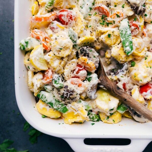 The finished tortellini casserole, satisfying and cheesy, bursting with color and flavor.