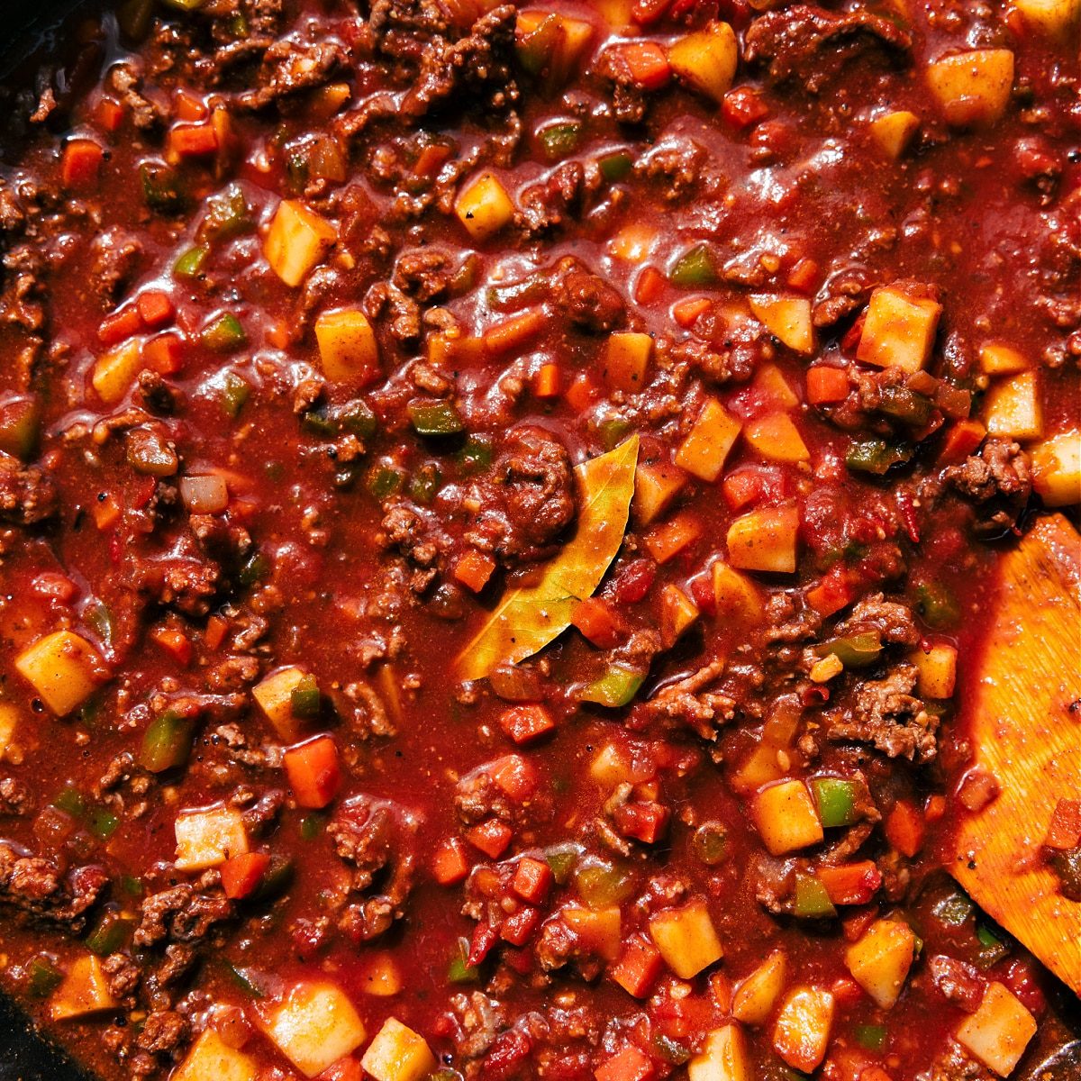The dish in a skillet simmering together.