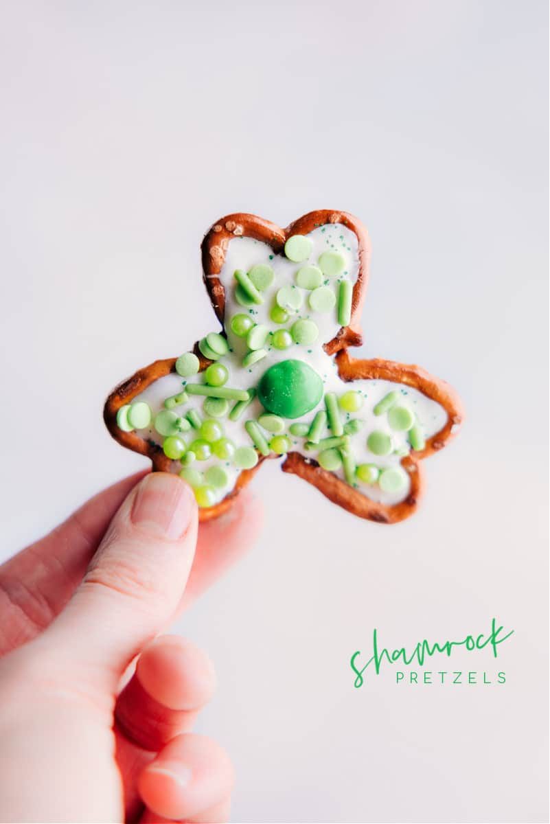 Pretzel Shamrocks being held up.