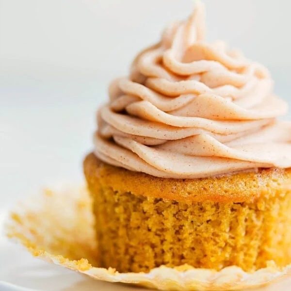 Ready to eat satisfying pumpkin cupcake with a cinnamon cream cheese frosting.