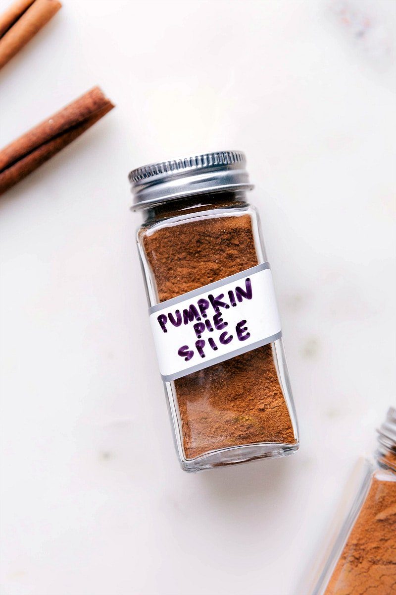 Container of aromatic pumpkin pie spice, a reliable addition to fall recipes.