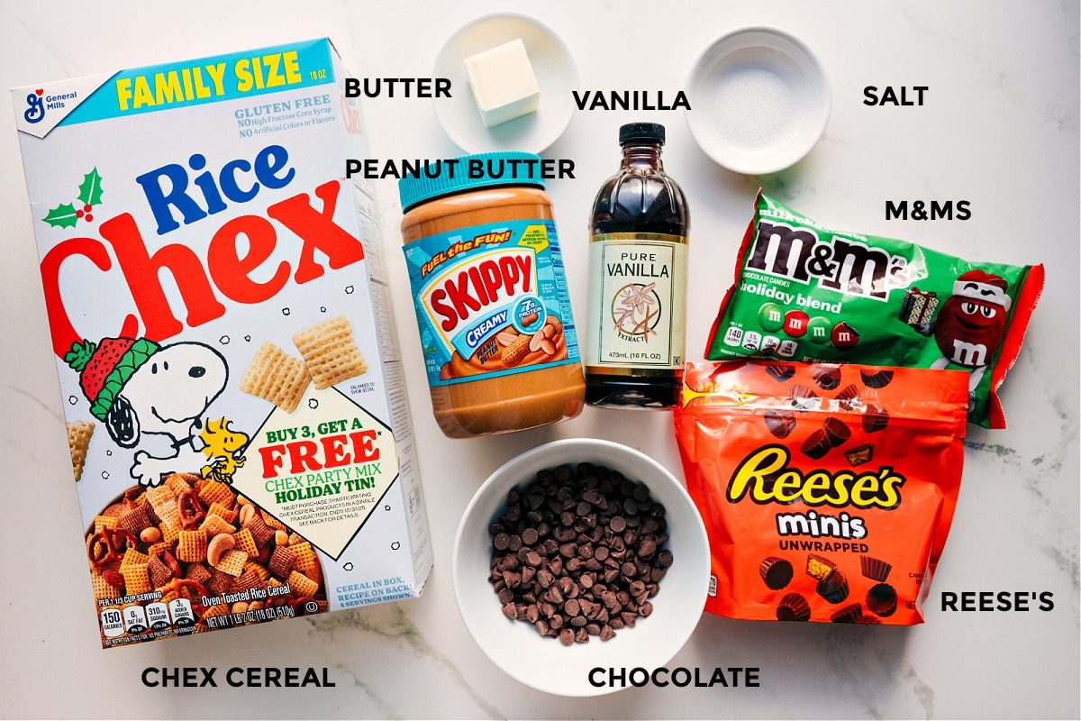 All the ingredients for this recipe prepped and ready to go, including Rice Chex cereal, butter, peanut butter, vanilla, salt, M&Ms, Reese’s, and chocolate chips.