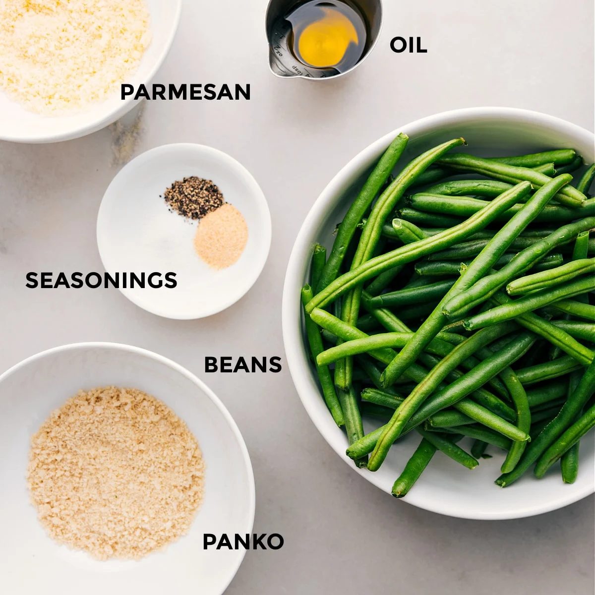 Ingredients are prepped for straightforward assembly: beans, panko, seasonings, oil, and parmesan.