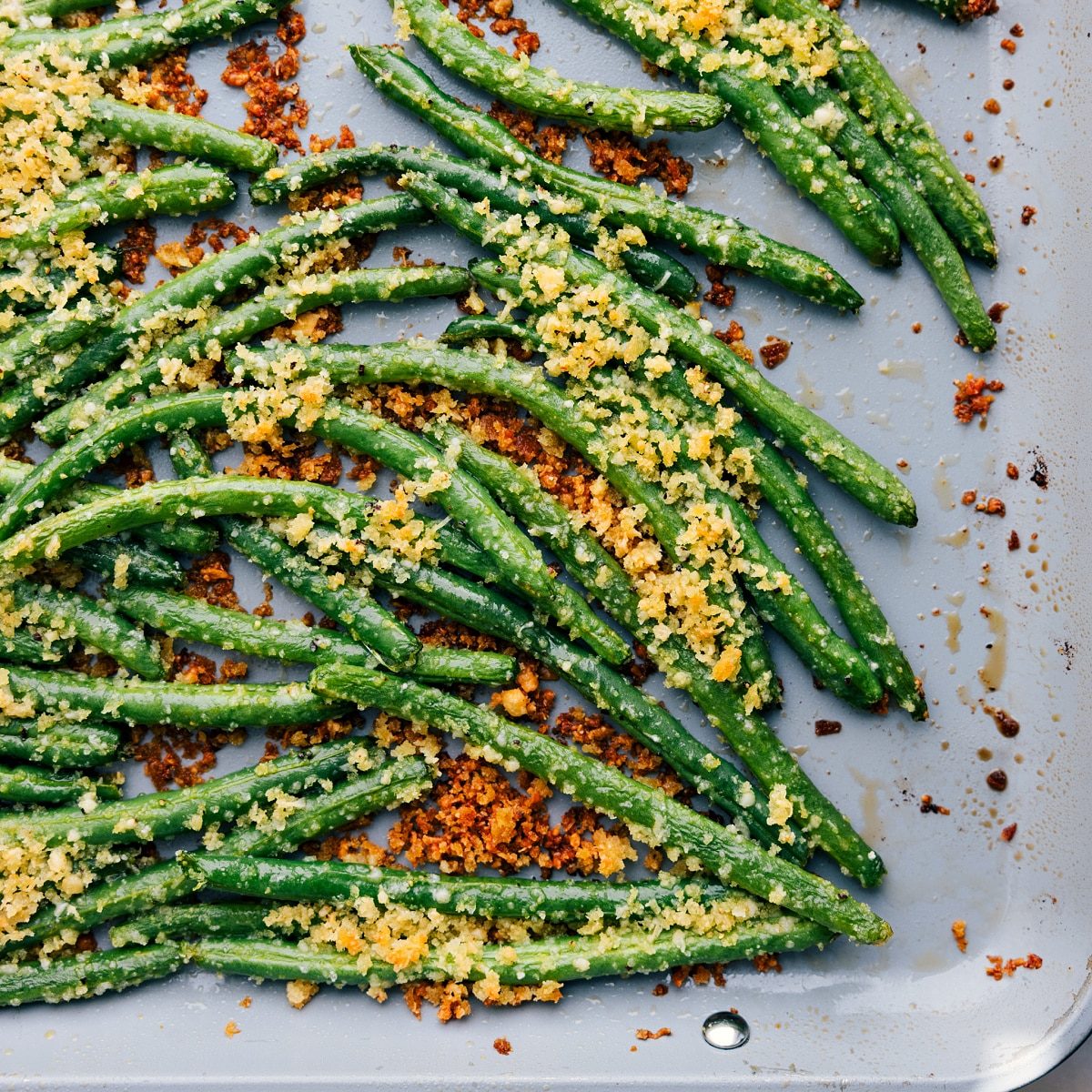 Veggies roasting on a tray, turning crispy and satisfying.