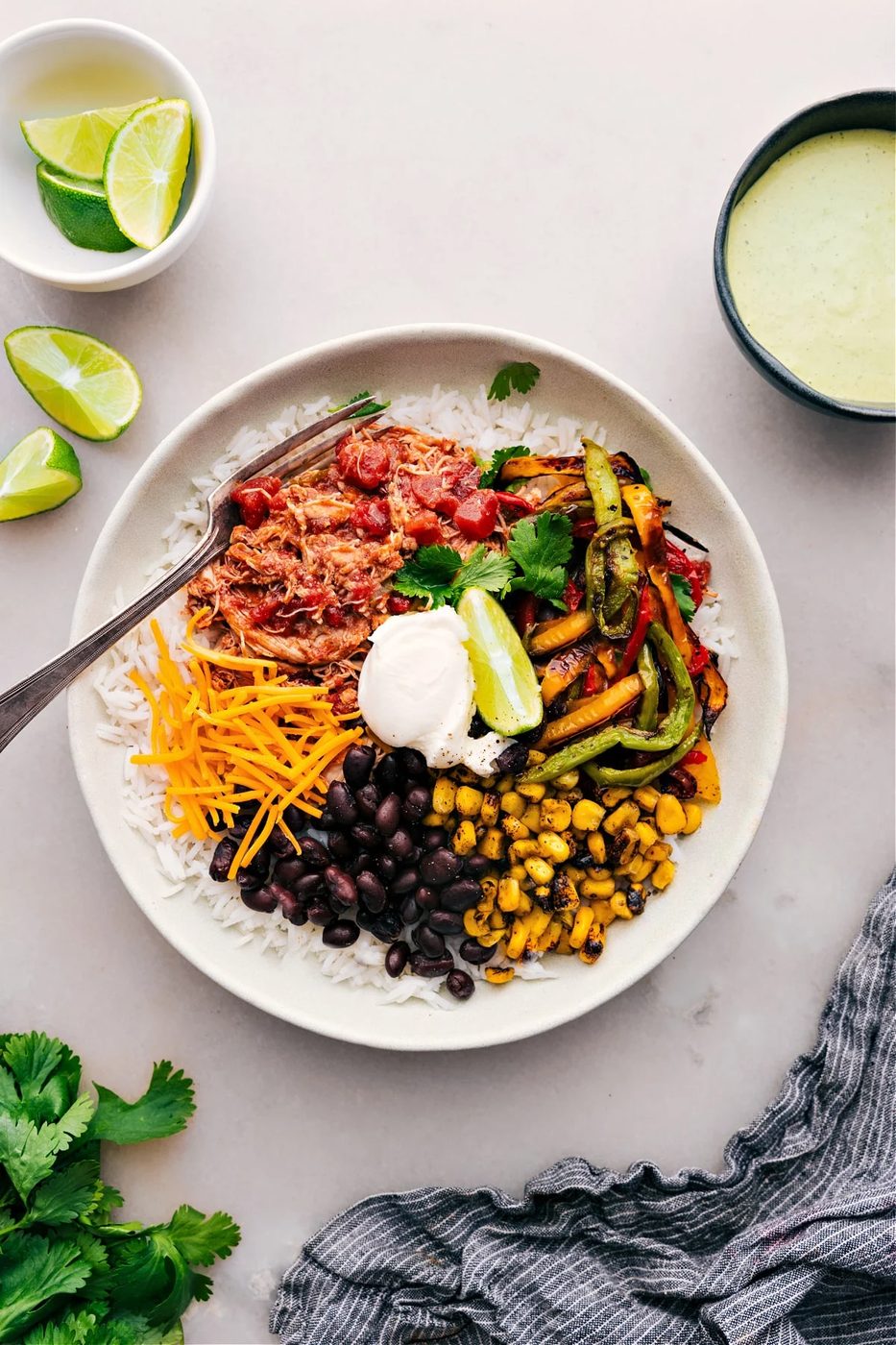 Big bowl of Salsa Chicken slow cooker ready to be enjoyed.