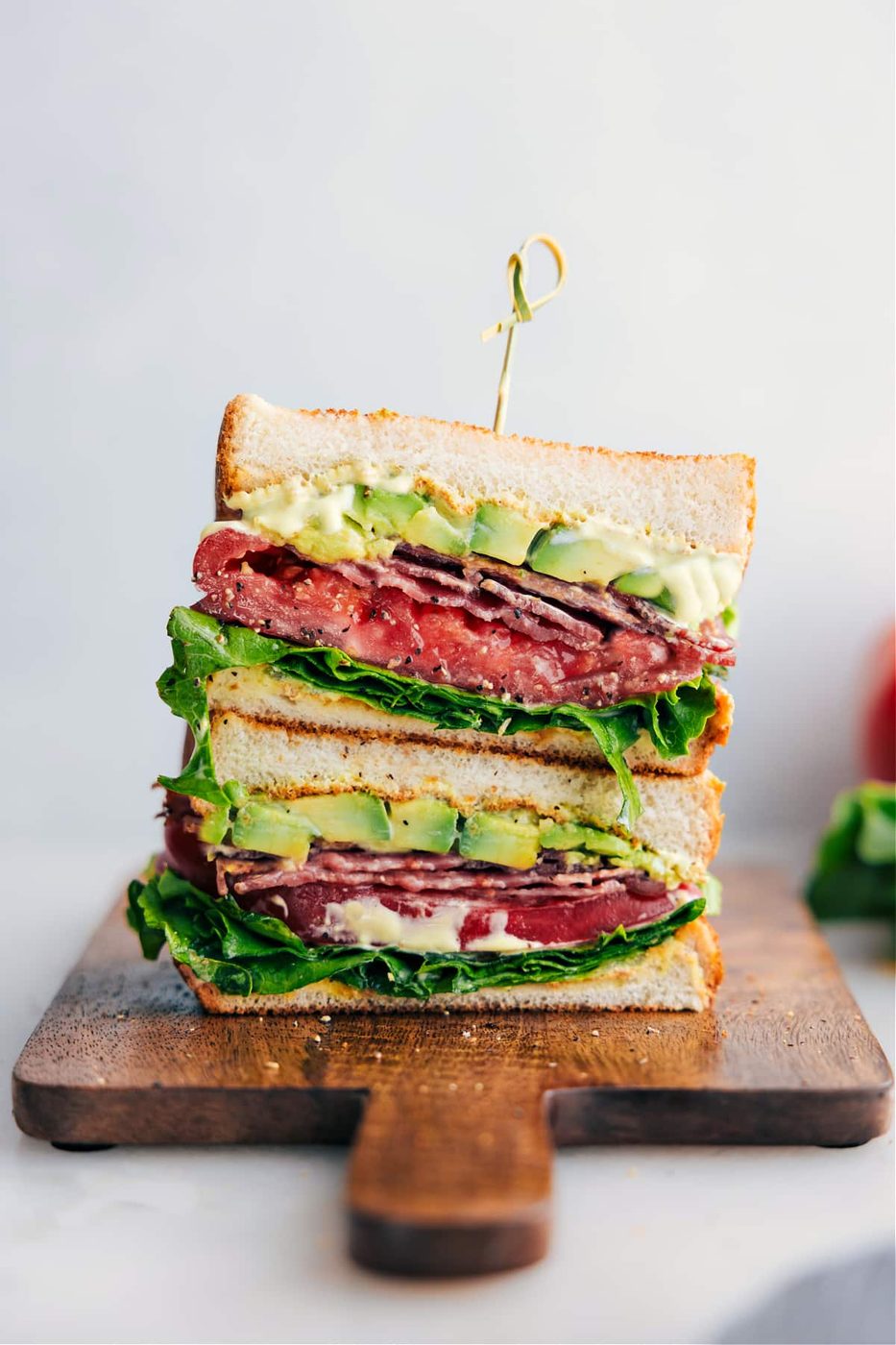 BLT sandwich recipes stacked with crispy bacon, lettuce, tomato, and creamy sandwich spread.