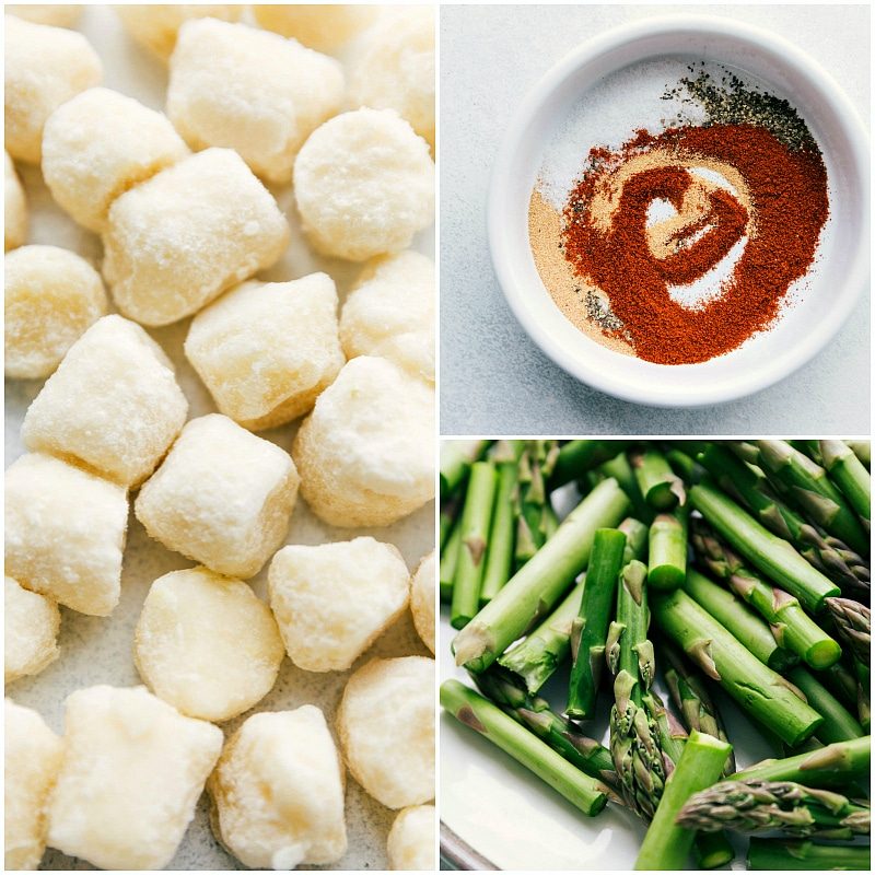 Process shot of frozen cauliflower gnocchi, cut up asparagus, and an straightforward seasoning mix.
