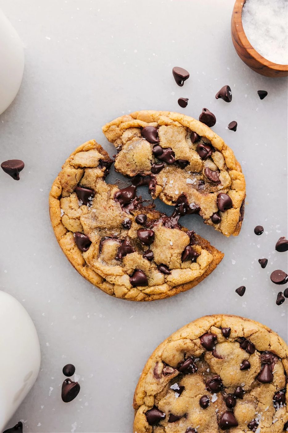 Single serve chocolate chip cookie recipe broken apart showing the gooey, satisfying inside.