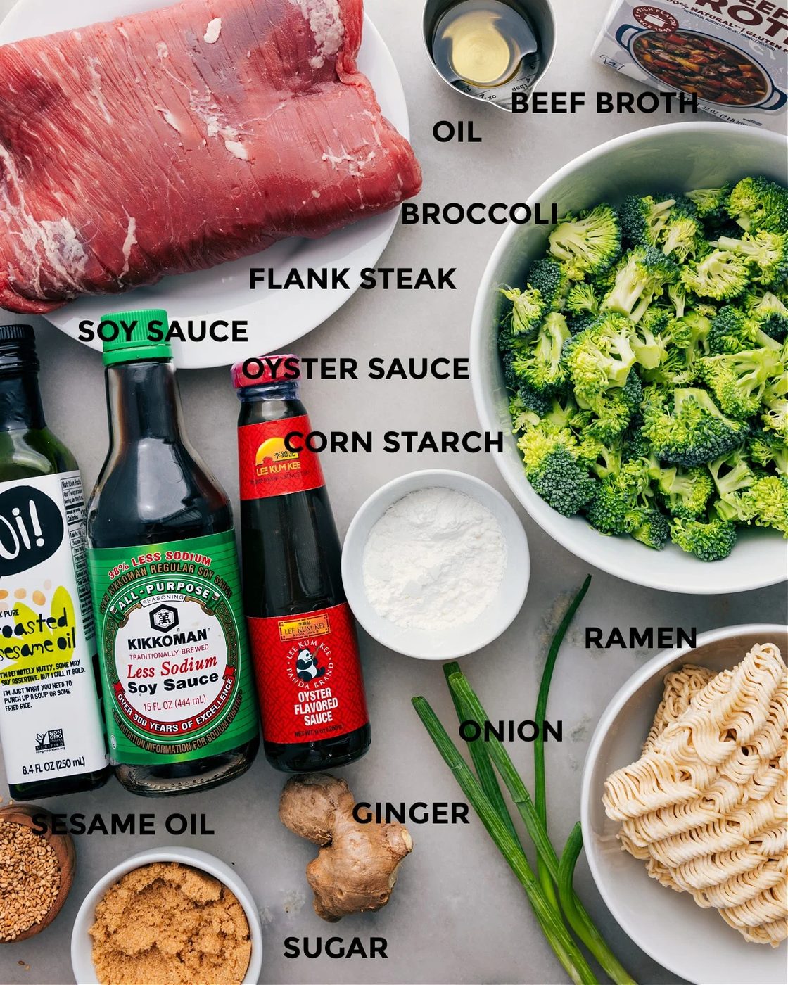 All the ingredients for this recipe are prepped and ready for straightforward assembly, including the meat, broccoli, steak, cornstarch, sauces, and noodles.