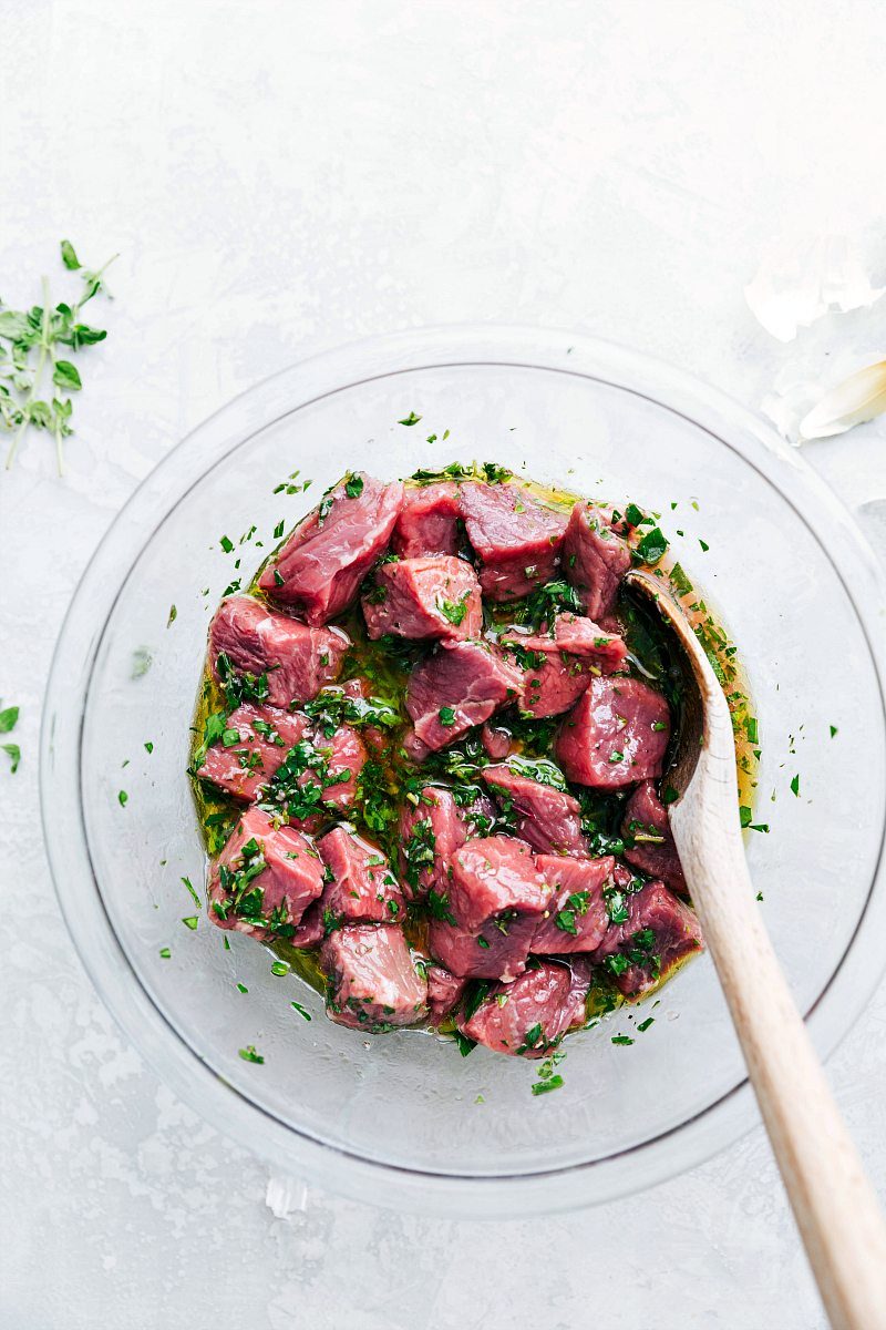 Raw meat in marinade mixture.