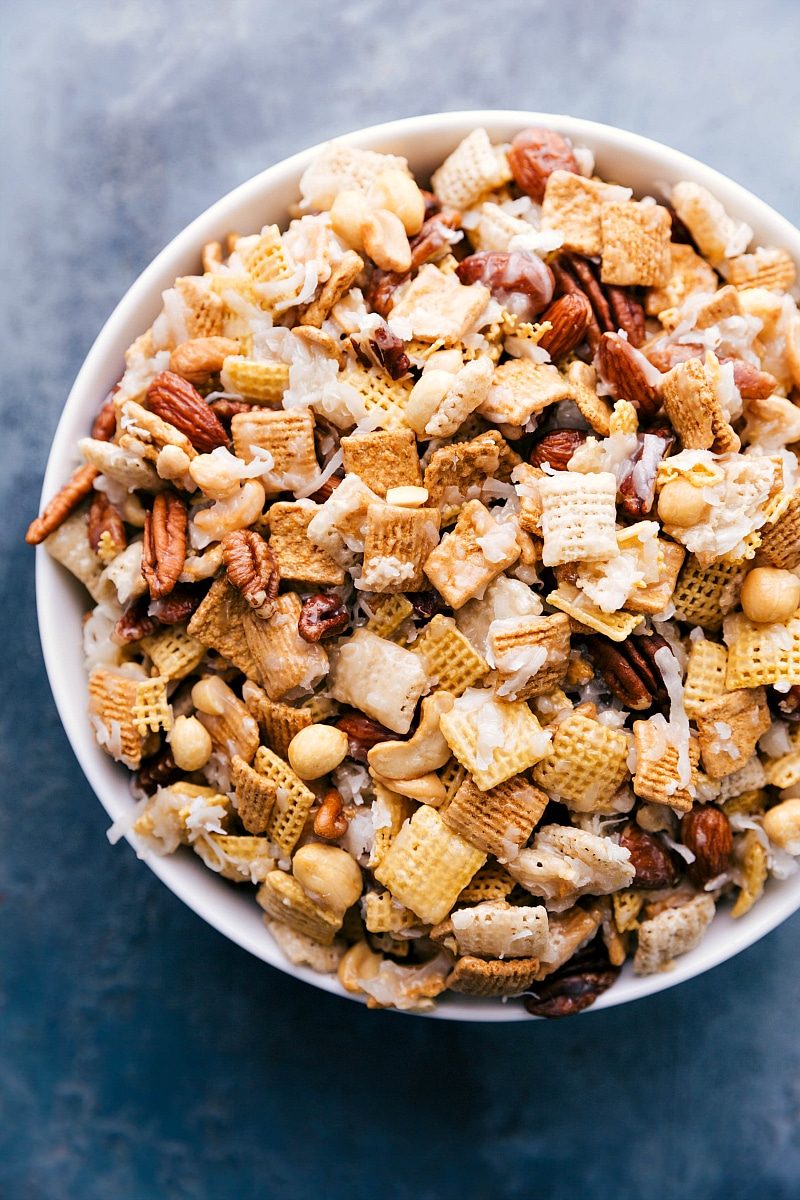 Sweet chex mix in a bowl, a satisfying and sweet snack, ideal for any event and ready to be enjoyed.