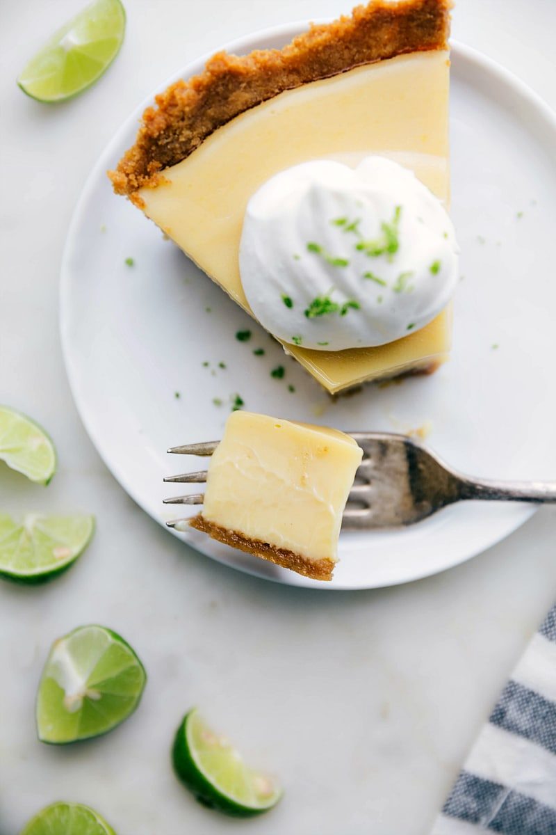 A satisfying sweet and tangy slice of dessert with a bite taken out of it.