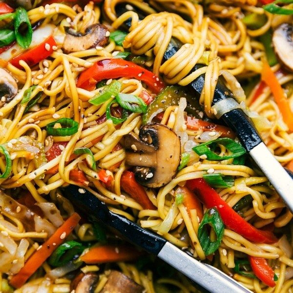 Finished chow mein noodles coated in satisfying sauce with vegetables mixed throughout.