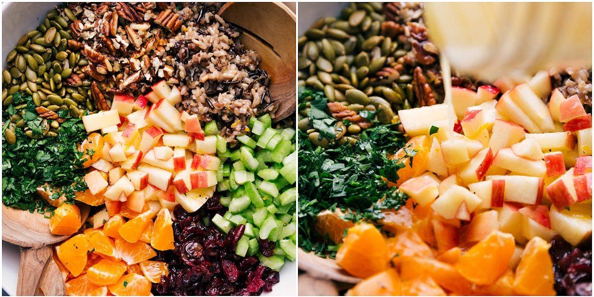 All the ingredients for this wild rice pilaf added to a bowl and dressing being drizzled on top.