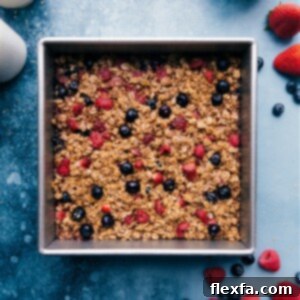 Delicious Baked Oatmeal with fresh berries, ready to eat.