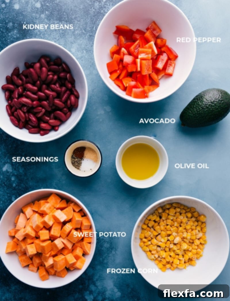 Key ingredients for building a flavorful Meatless Kidney Bean Bowl: fresh parsley, lemons, cashews, sweet potatoes, kidney beans, and red bell peppers