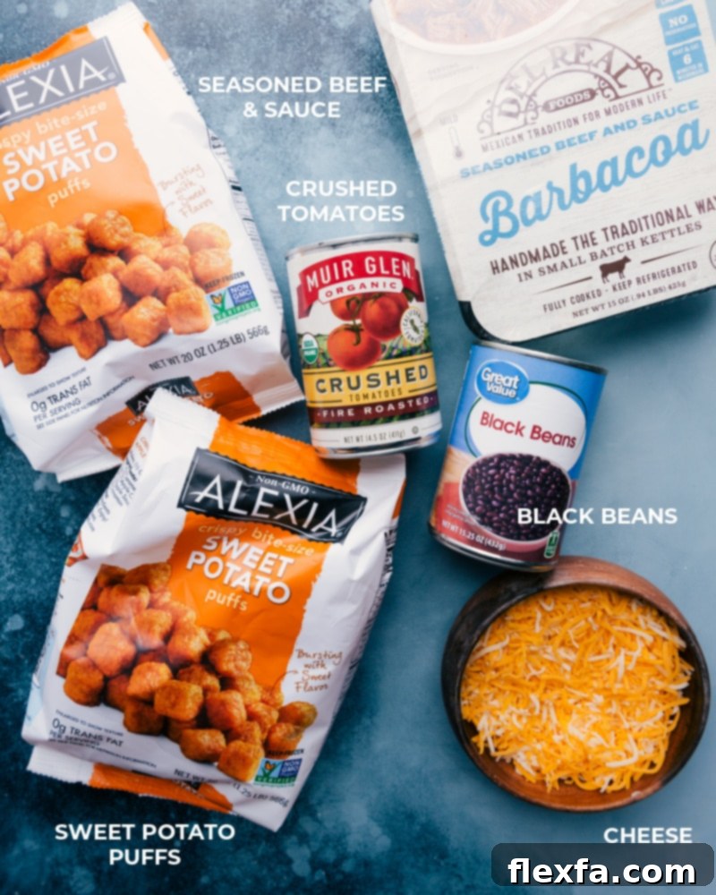 Deconstructed Beef Totchos ingredient spread. This simple sheet pan meal uses less than 10 ingredients for a quick and easy dinner. Recipe via ChelseasMessyApron #dinner #quick #easy #simple #best #30mins #avocado #cheese #tatertots #sweetpotato #deconstructed #beef #totchos Ingredient shot - Image of all the ingredients used in Deconstructed Beef Totchos recipe