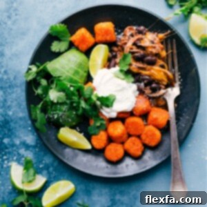 Deconstructed Beef Totchos served on a plate with fresh toppings