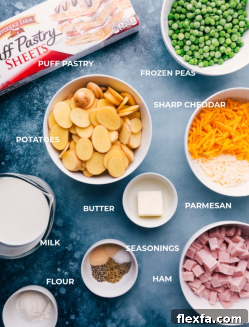 Ingredients for Ham and Potato Pot Pie laid out, including thinly sliced potatoes, cubed ham, various cheeses, butter, milk, flour, and seasonings.