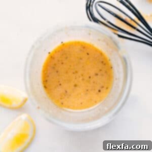 A delicious Lemon Vinaigrette in a glass jar.