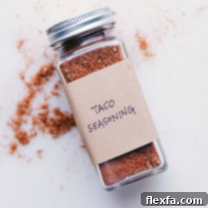 A bowl of vibrant homemade taco seasoning ready to use.