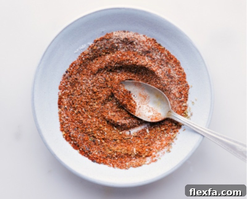 Overhead image of freshly mixed Homemade Taco Seasoning in a bowl, ready to be used or stored.