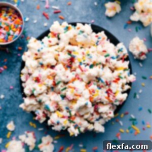 Finished Cake Batter Popcorn with sprinkles in a bowl.