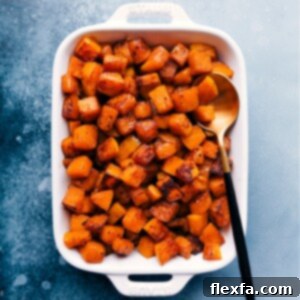 A serving of beautifully roasted butternut squash with herbs