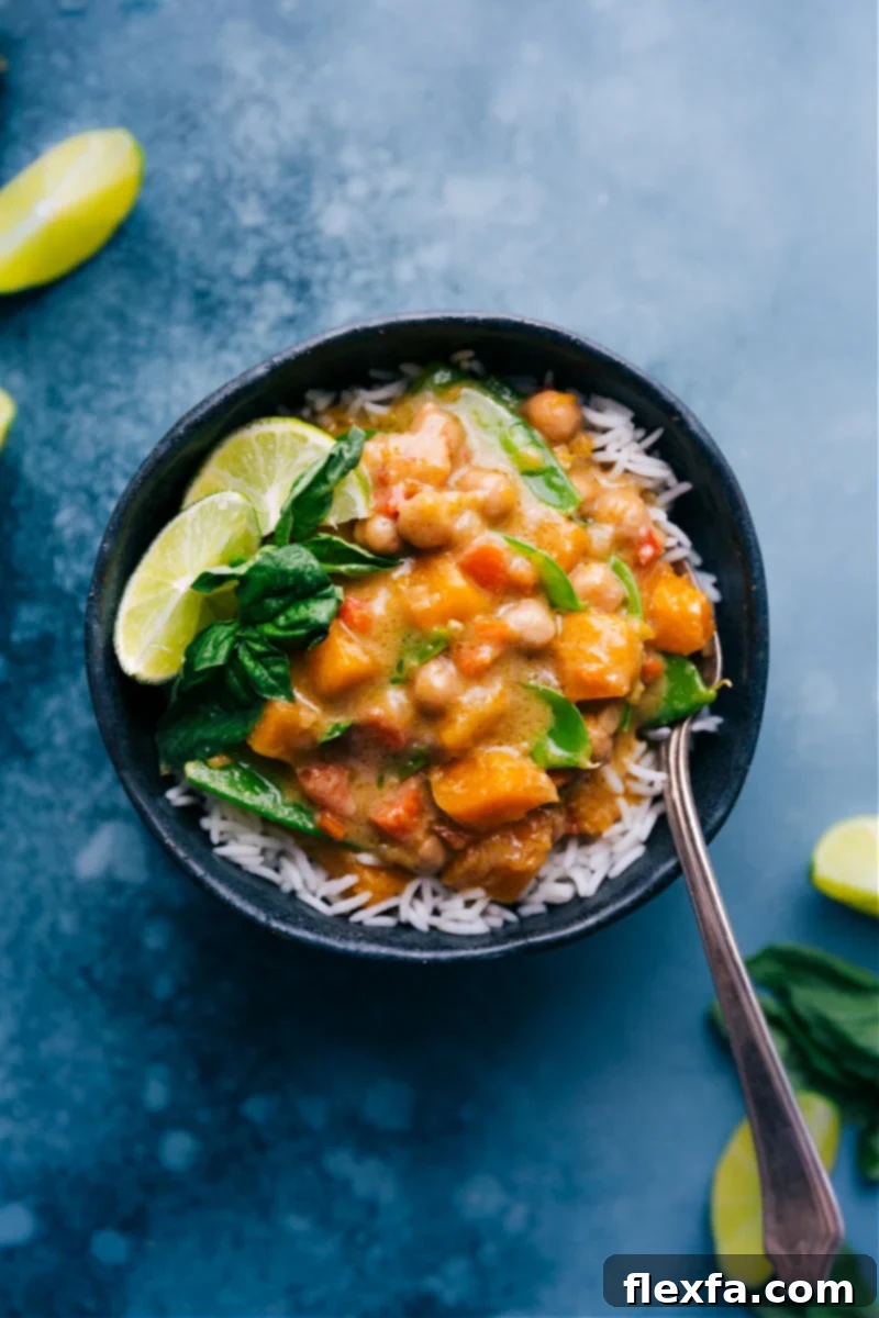 Aromatic Vegetarian Thai Green Curry bowl with fresh lime and basil garnish, served over rice