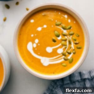 A bowl of creamy pumpkin soup