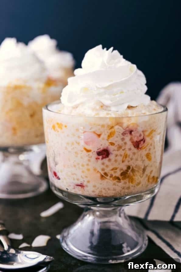 Delicious Frog Eye Salad, a retro side or dessert salad with acini de pepe pasta, canned fruits, and whipped topping.