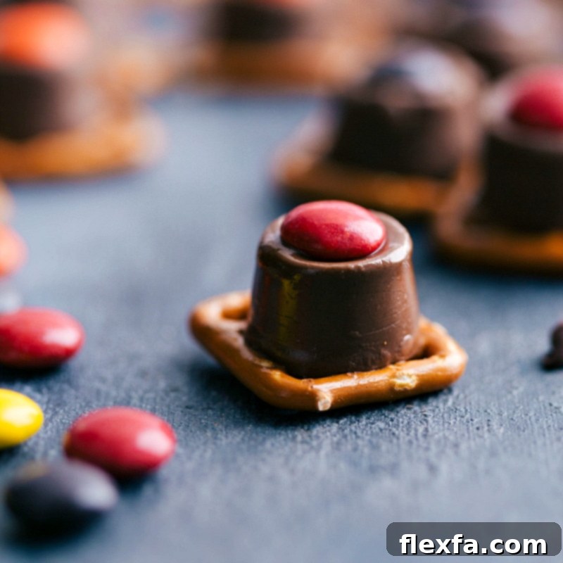 Delicious and adorable caramel Thanksgiving pretzels, beautifully decorated and ready to be served for the holiday season.