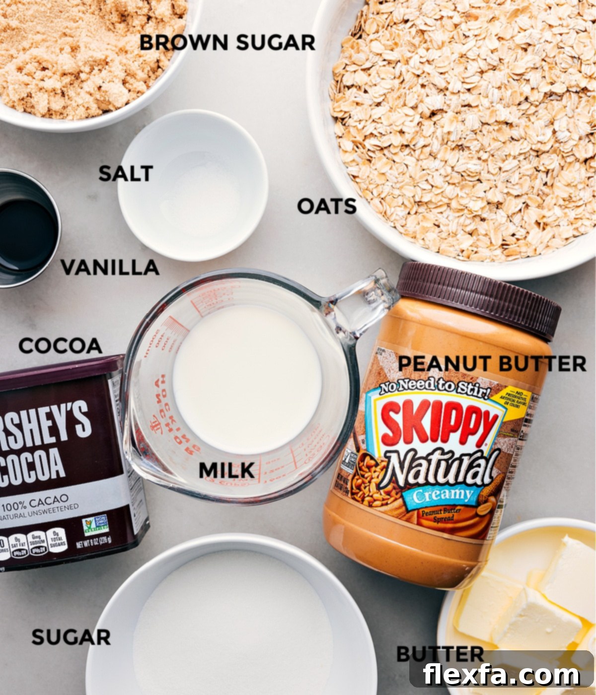 Neatly arranged ingredients for no bake cookies, including oats, salt, creamy peanut butter, vanilla extract, cocoa powder, and brown sugar, ready for assembly.