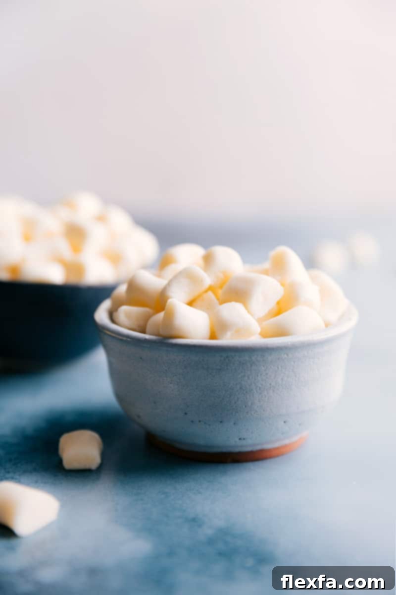 A beautiful bowl of homemade Butter Mints, showcasing their soft, creamy texture and inviting appearance, perfect for any occasion.
