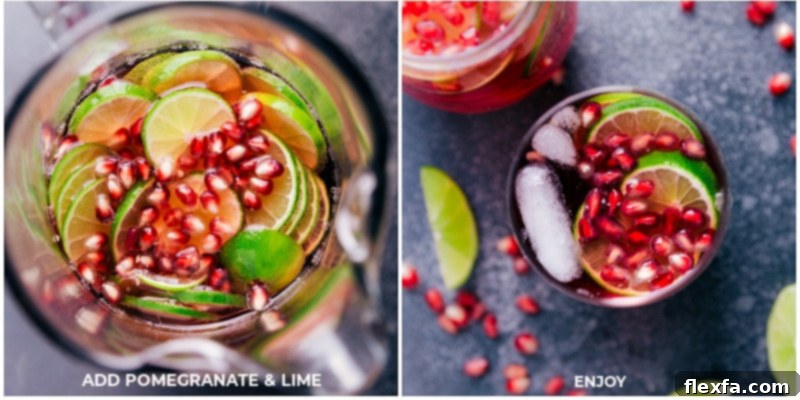 A garnished glass of sparkling pomegranate juice ready to be enjoyed with a sugar rim and lime slice.