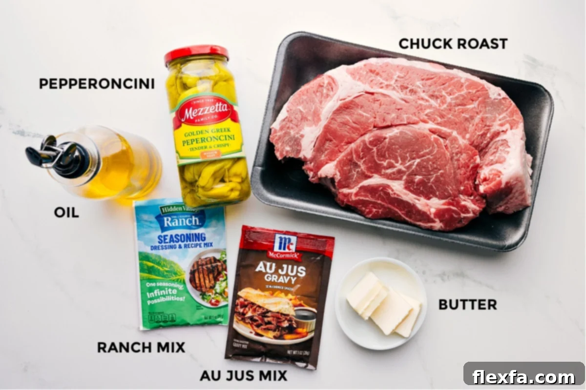 All the essential ingredients prepped and ready for the Crockpot Mississippi Pot Roast: chuck roast, ranch mix, au jus mix, butter, and pepperoncini, along with olive oil.