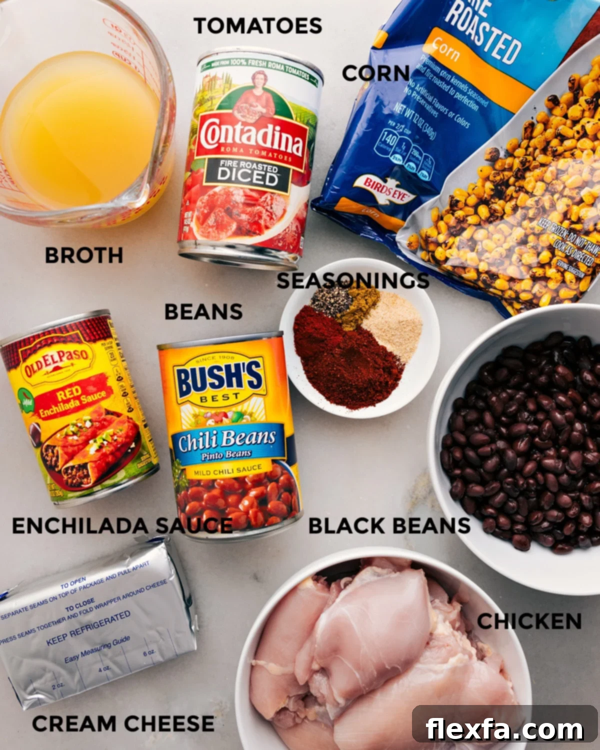 Prep all the essential ingredients for this creamy chicken chili recipe, including diced tomatoes, chicken broth, various beans, a blend of seasonings, sweet corn, tender chicken, rich enchilada sauce, and softened cream cheese, for effortless assembly in your slow cooker.