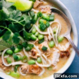 A steaming bowl of homemade Green Curry Noodle Soup