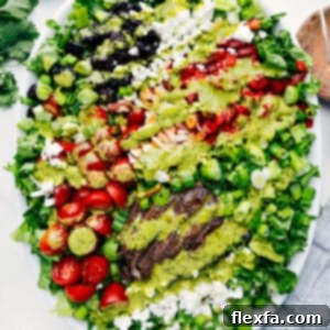 Close-up of the finished Steak Salad with grilled steak slices and fresh toppings