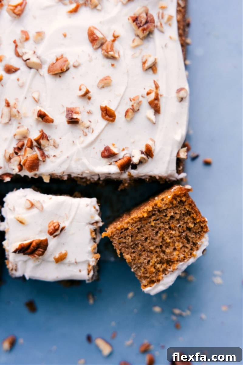 Overhead view of the finished Gluten-Free Carrot Cake, beautifully frosted and garnished, ready to be served and enjoyed.