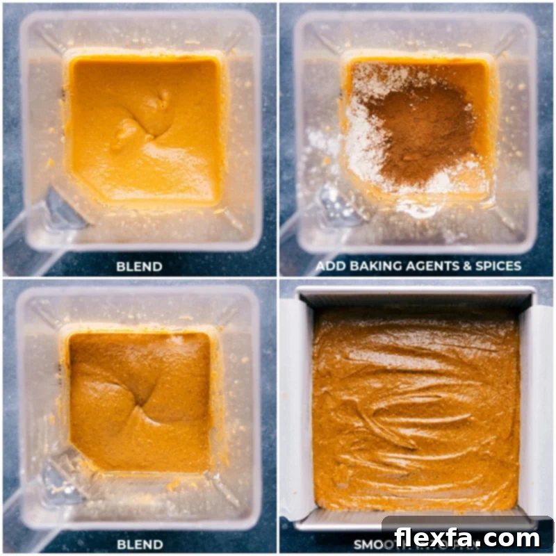 Blender filled with pumpkin cake batter, showing spices and baking agents added, before being poured into a parchment-lined baking pan.