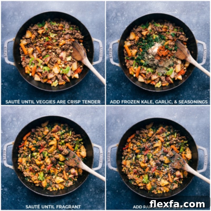 Process shot showing cooked sausage and vegetables in a skillet, with kale, garlic, and seasonings being stirred in.