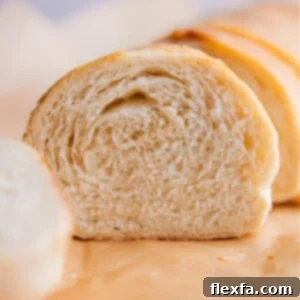A freshly baked loaf of homemade French Bread, golden brown and crusty.