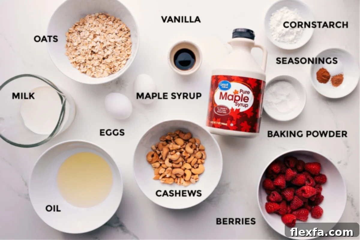 All the fresh and wholesome ingredients laid out for preparing Healthy Waffles, including plant-based milk, rolled oats, coconut oil, fresh eggs, raw cashews, pure vanilla extract, natural maple syrup, a bowl of mixed berries, baking powder, a pinch of salt, and cornstarch for extra crispness.