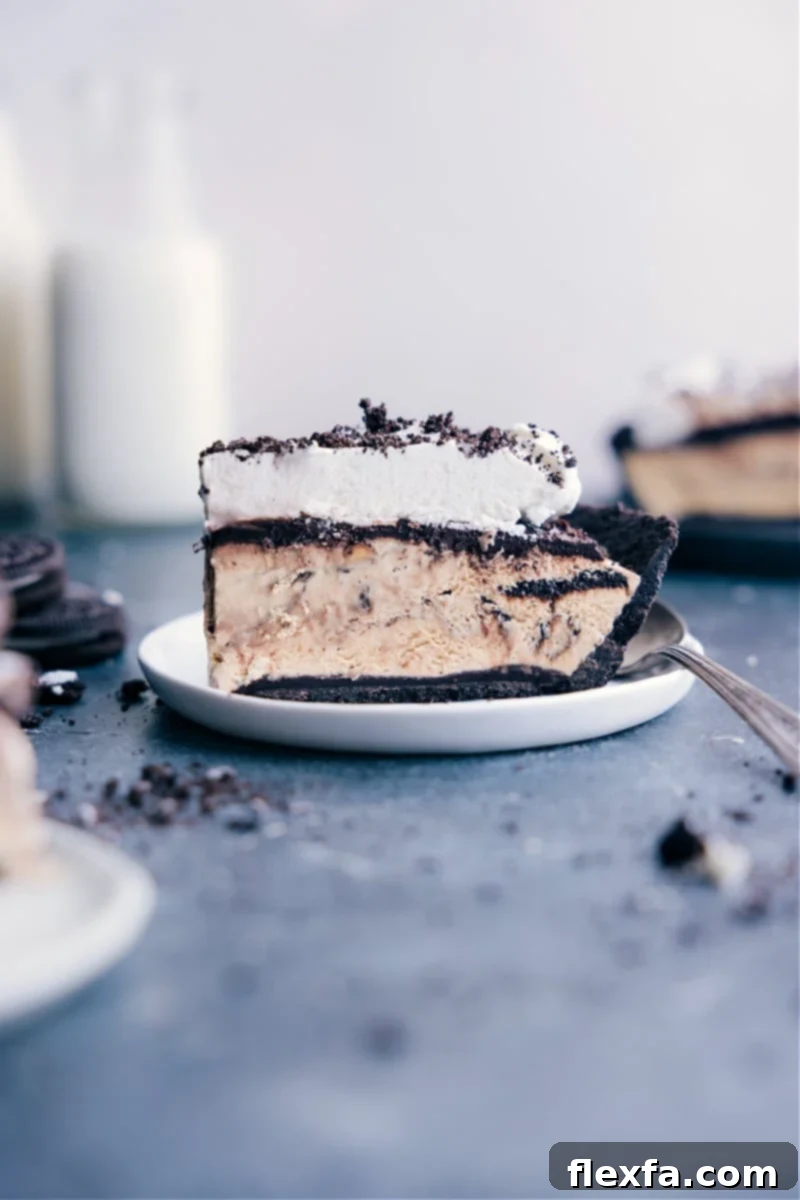 Image of a perfect slice of Mississippi Mud Pie on a plate, showcasing its decadent layers